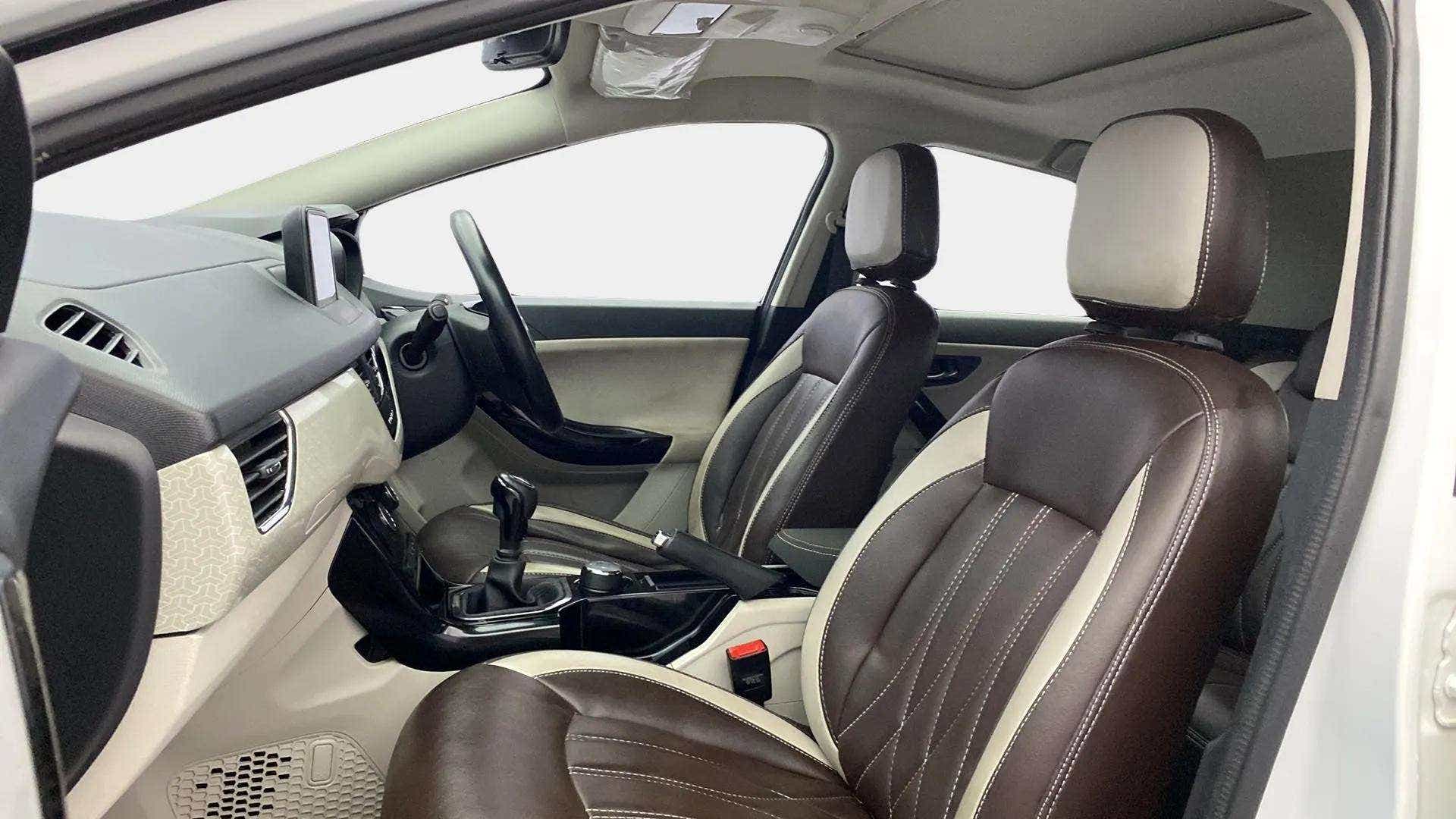 Front interior seats and dashboard of a Tata Nexon 2017-2023