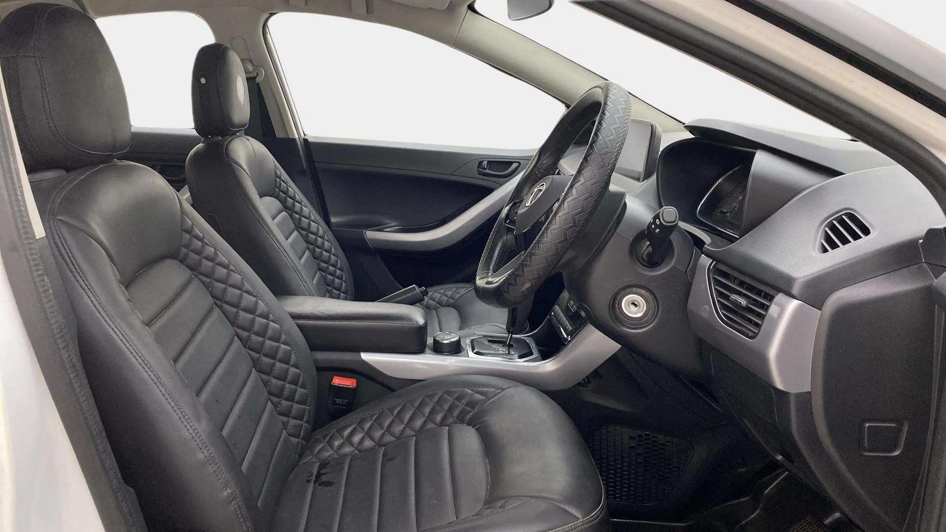 Interior dashboard and front seats of a Tata Nexon 2017-2023