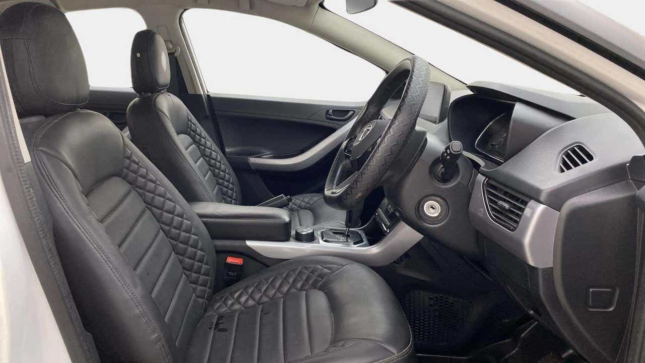 Interior dashboard and front seats of a Tata Nexon 2017-2023