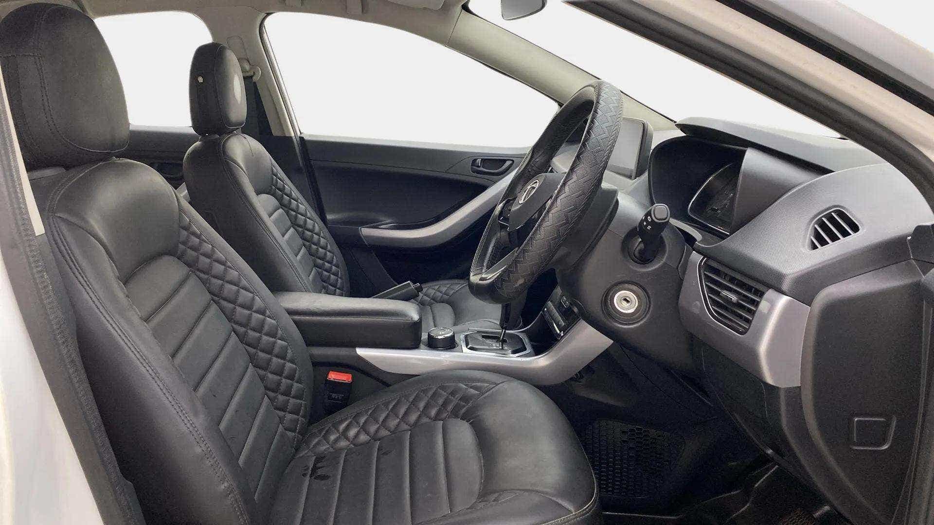 Interior dashboard and front seats of a Tata Nexon 2017-2023