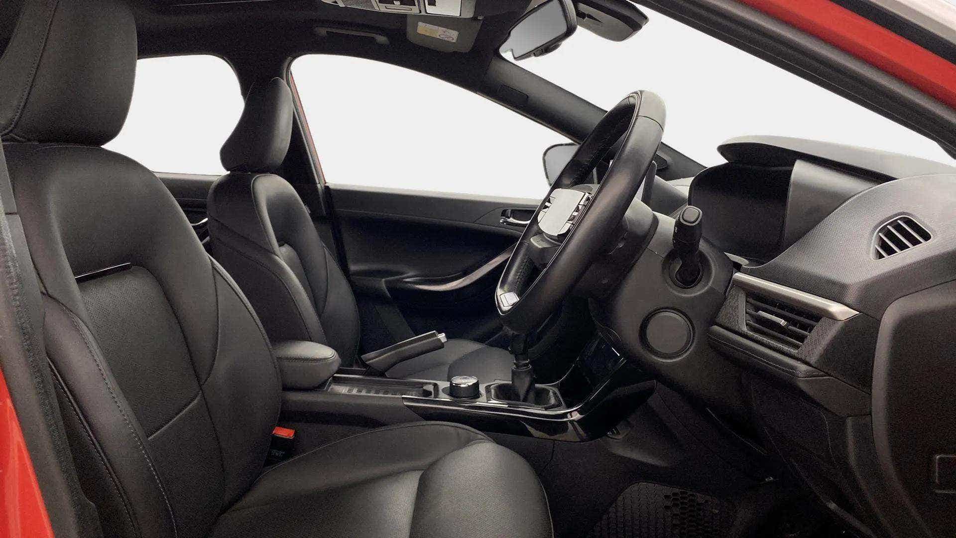 Interior front seats and dashboard of a Tata Nexon 2017-2023