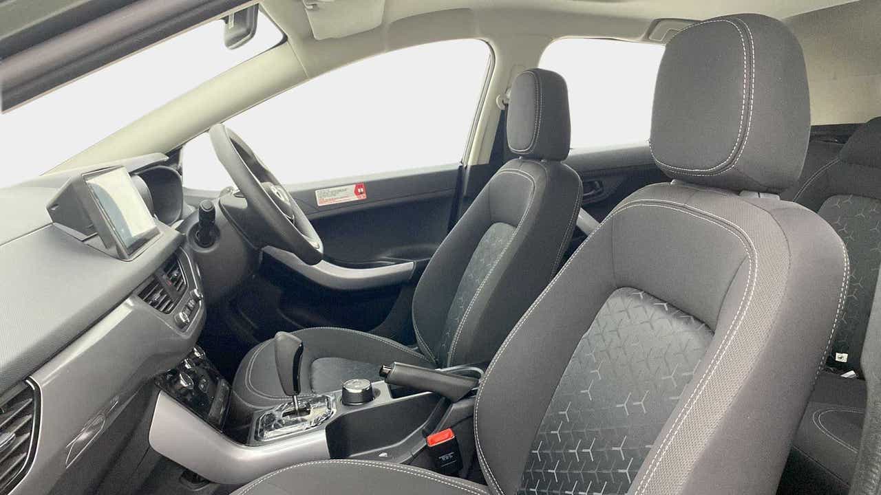 Interior front seats and dashboard of a Tata Nexon 2017-2023