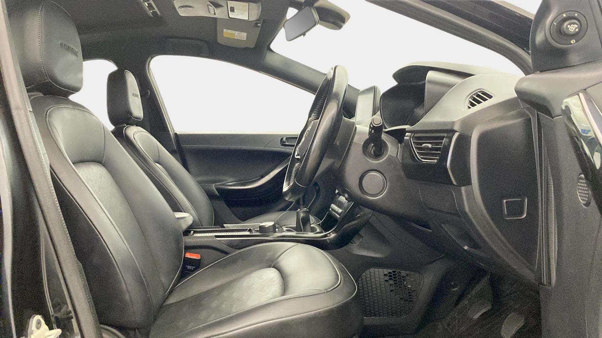 Interior front seats and dashboard of a Tata Nexon 2017-2023