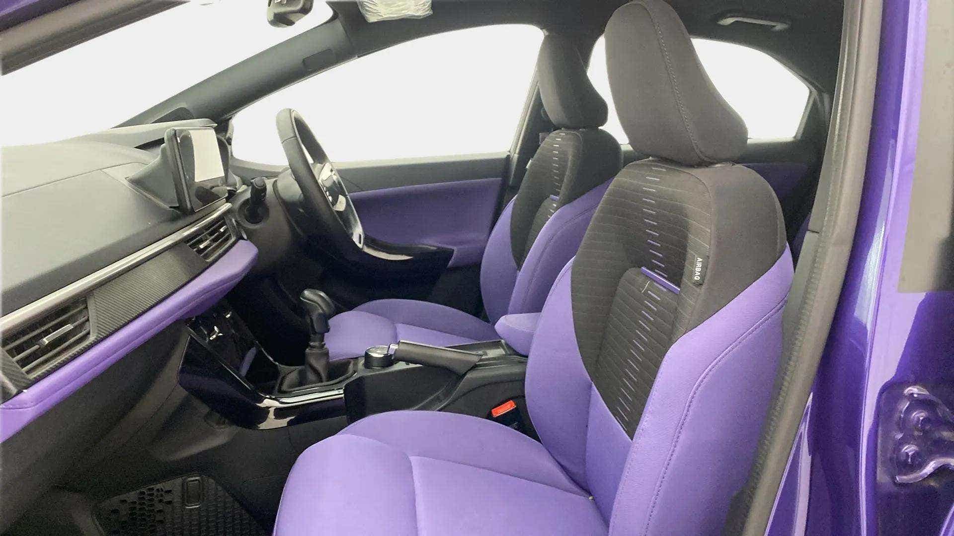 Front interior seats and dashboard of a Tata Nexon 2017-2023