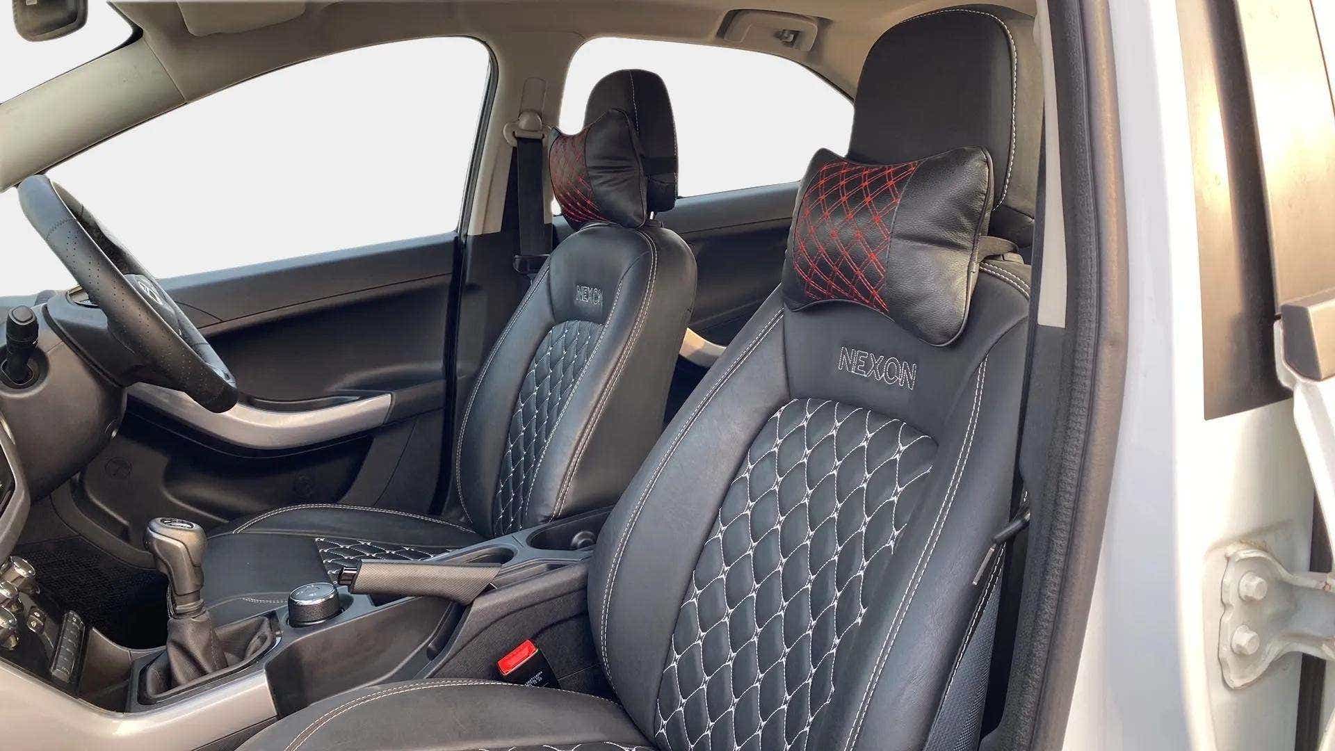 Front seat and dashboard view of a Tata Nexon 2017-2023