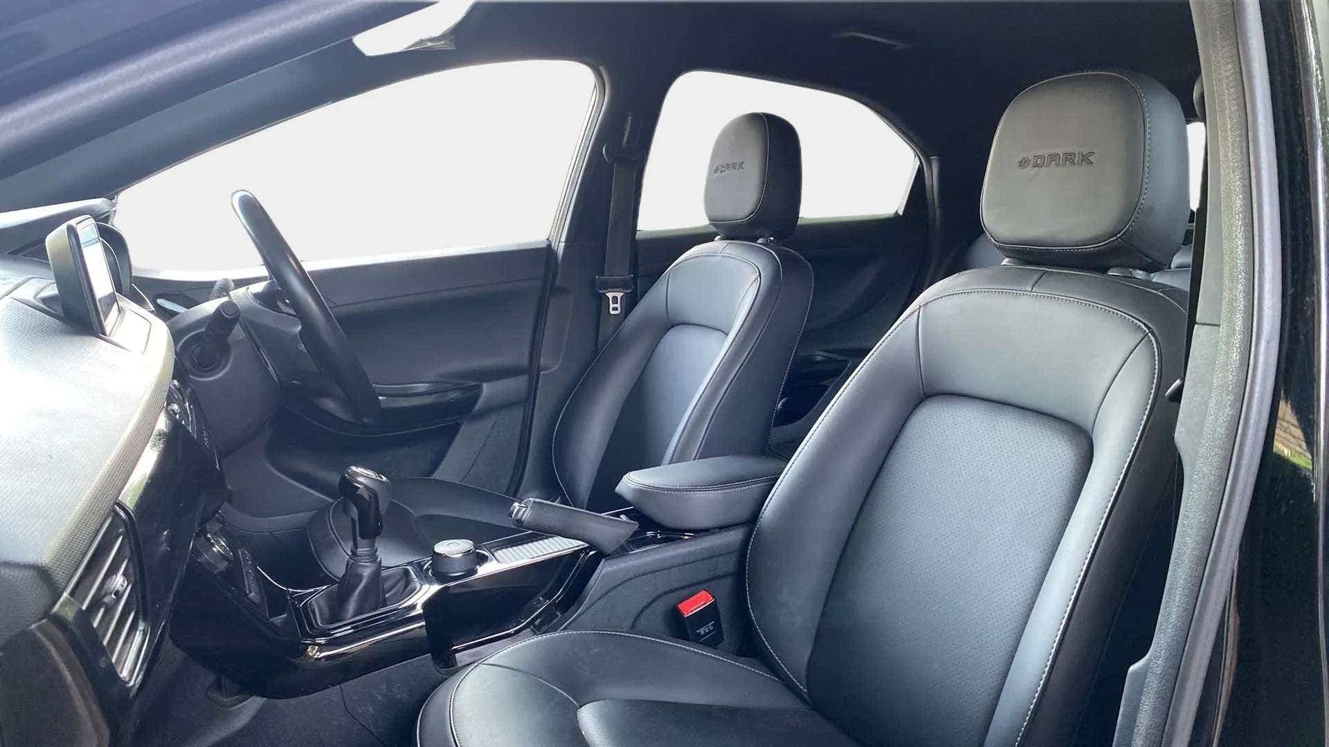 Interior front seats and dashboard of a Tata Nexon 2017-2023