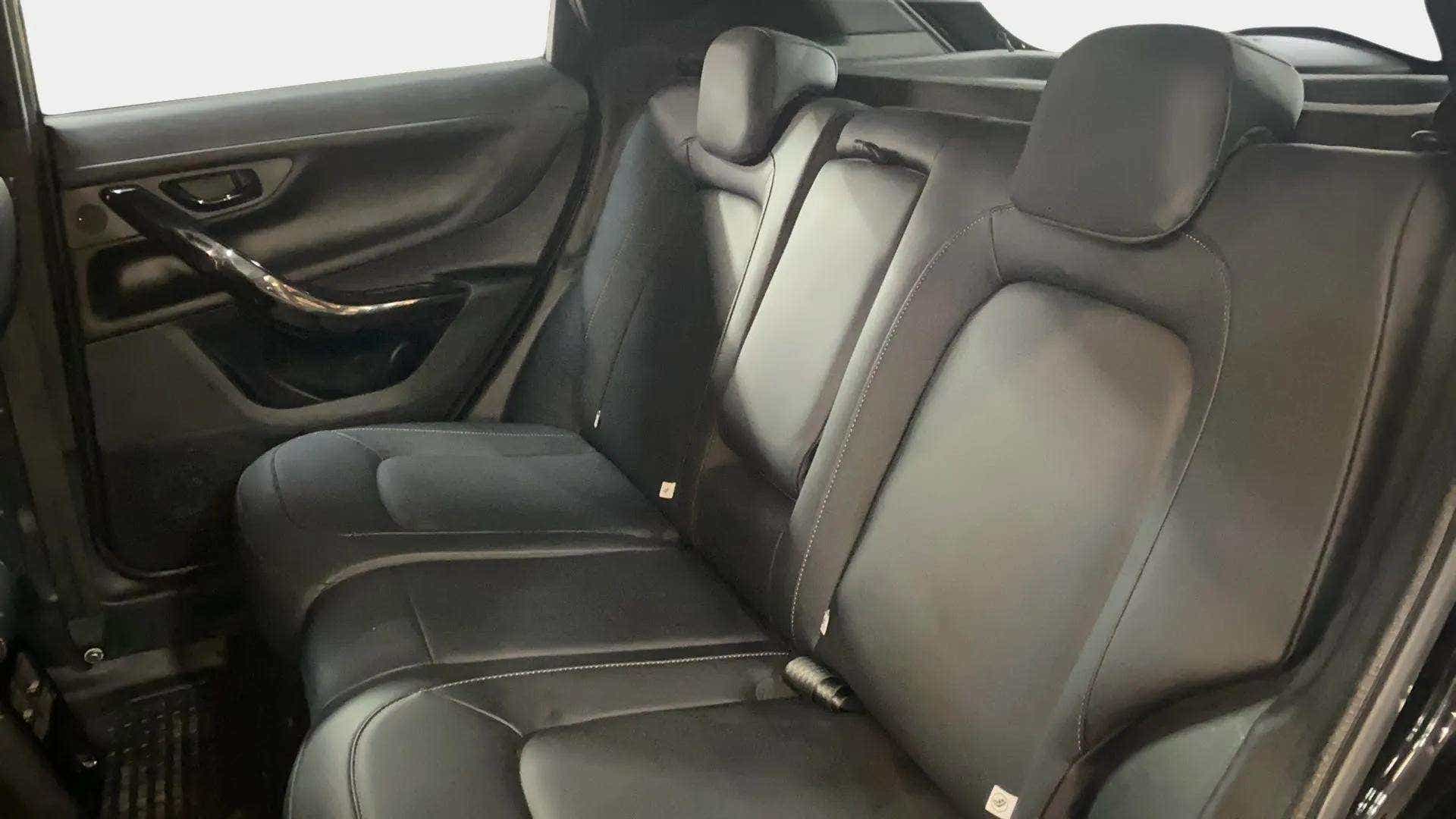 Rear seat and door panel view of a Tata Nexon 2017-2023