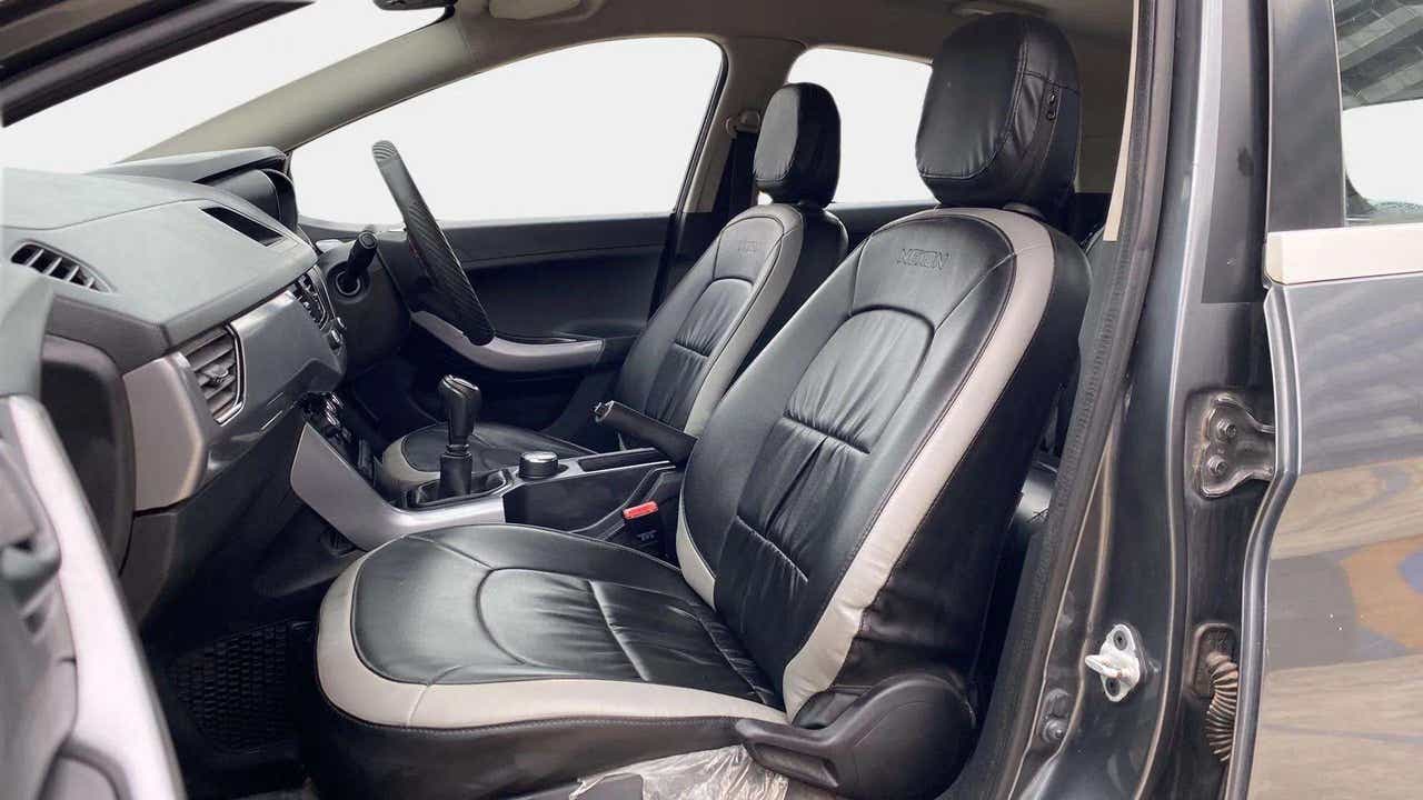 Interior front seats and dashboard of a Tata Nexon 2017-2023