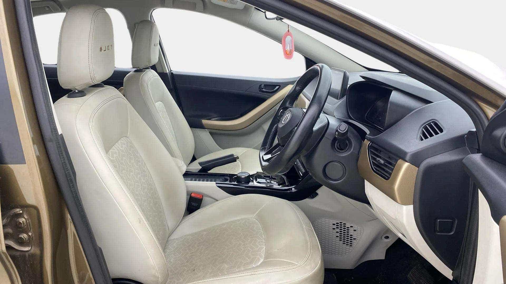 Interior front seats and dashboard of a Tata Nexon 2017-2023