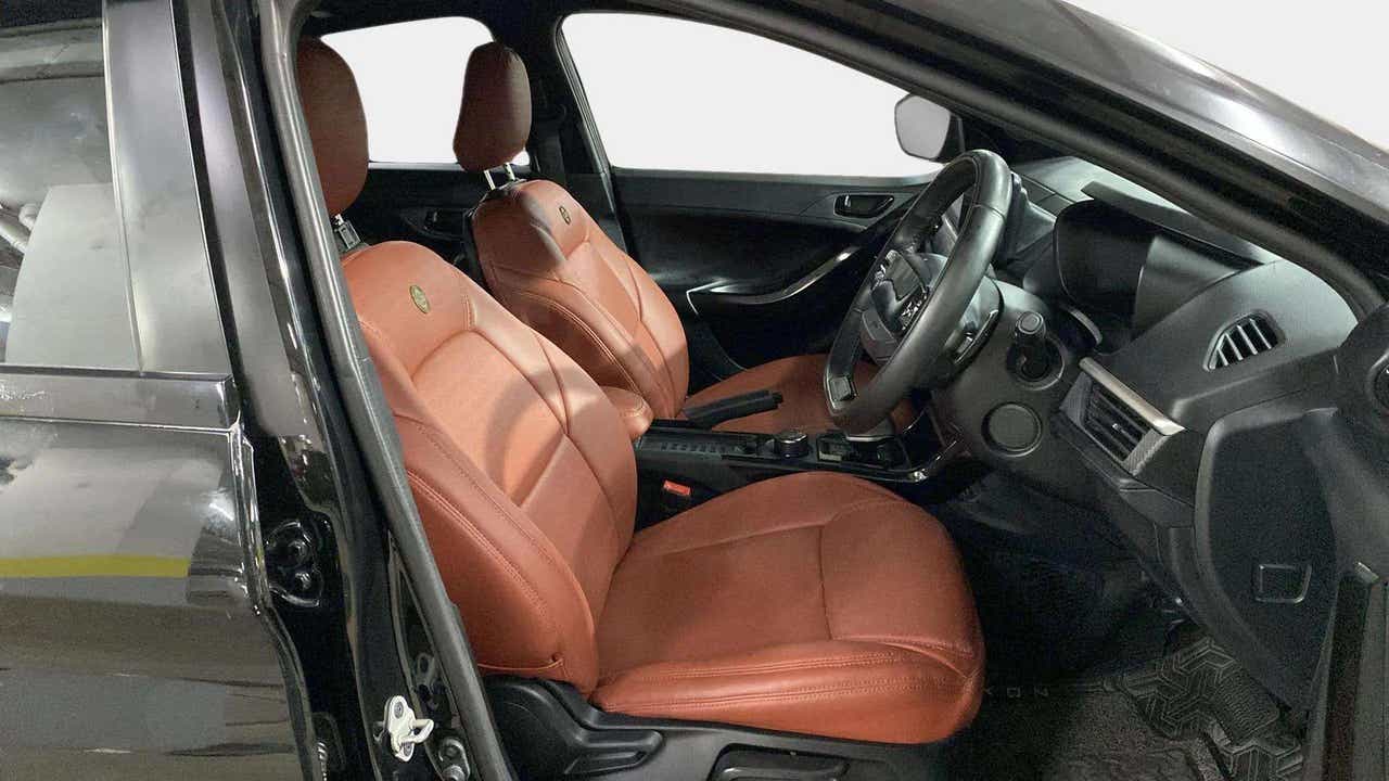 Interior front seats and dashboard of a Tata Nexon