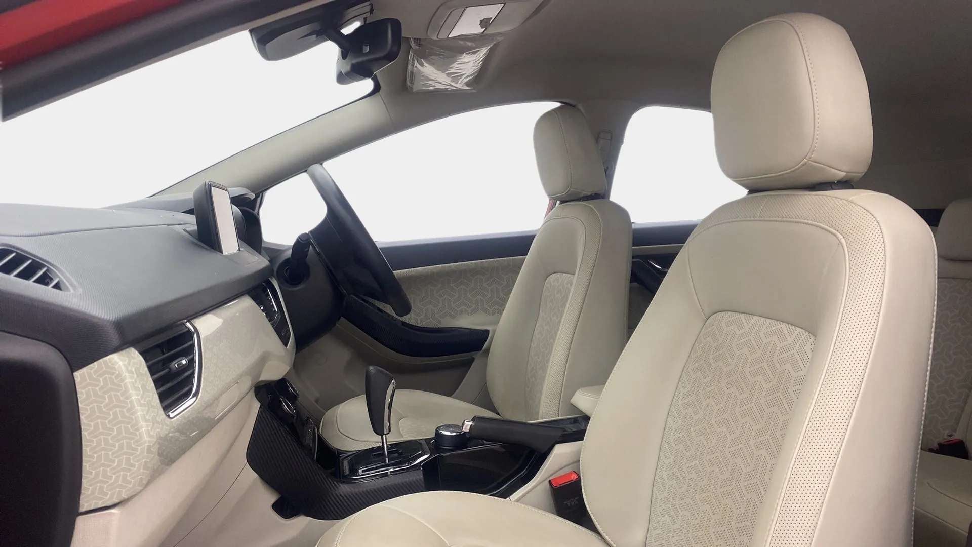 Interior dashboard and front seats of a Tata Nexon 2017-2023