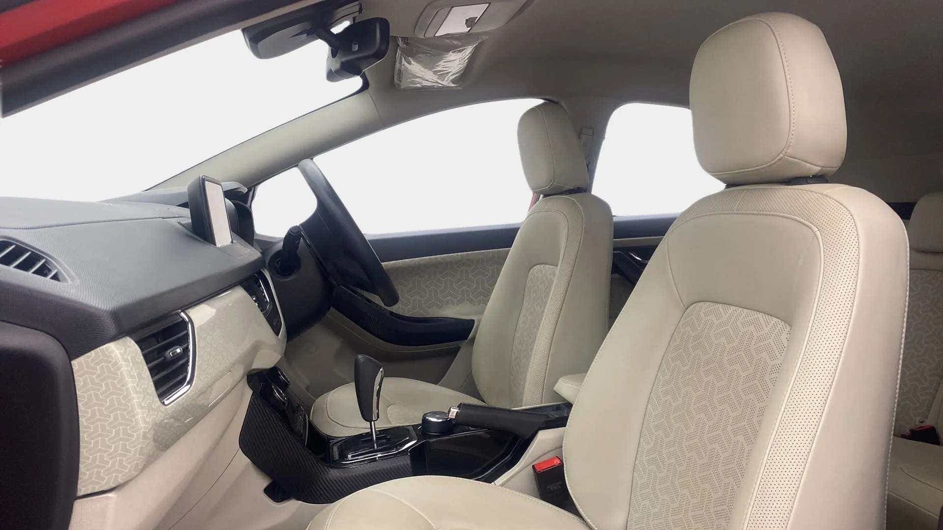 Interior dashboard and front seats of a Tata Nexon 2017-2023