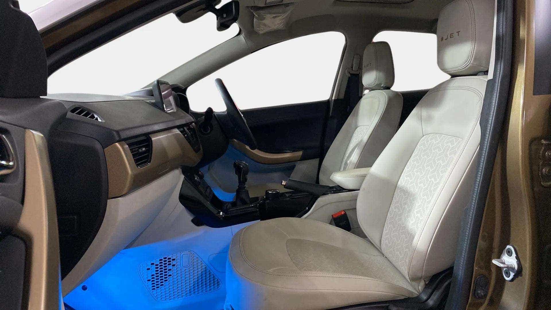 Interior dashboard and front seats of a Tata Nexon 2017-2023