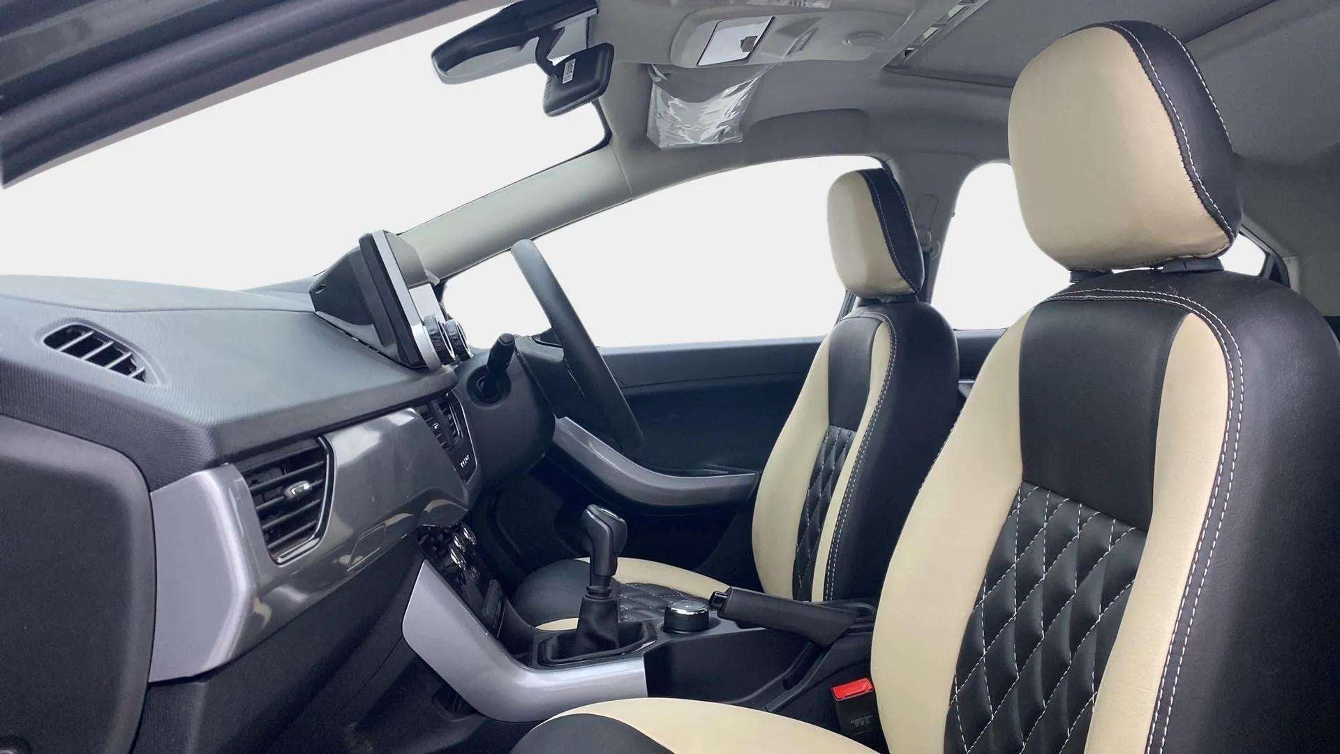 Interior dashboard and front seats of a Tata Nexon 2017-2023