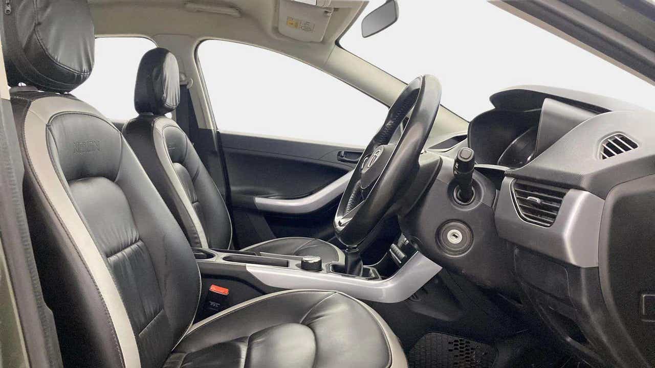 Interior dashboard and front seats of a Tata Nexon 2017-2023