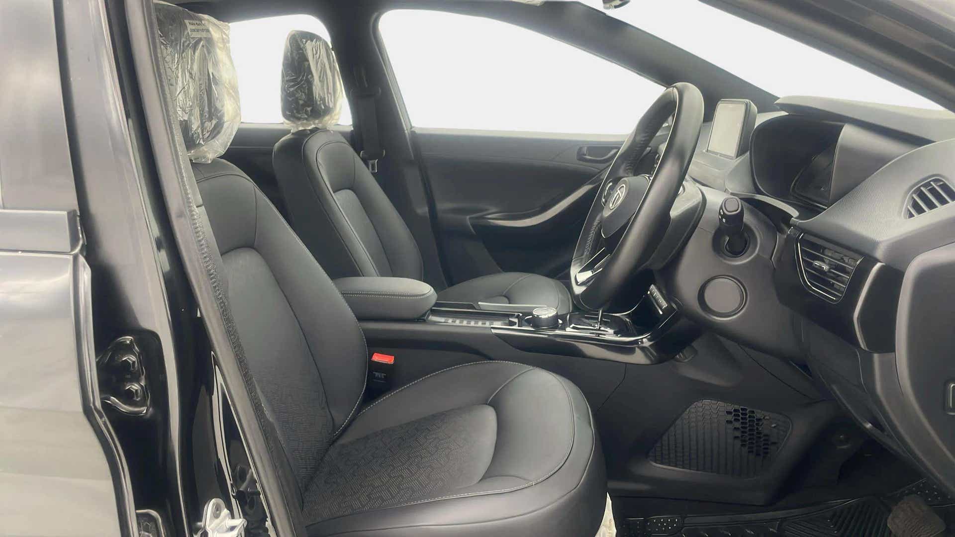 Interior front seats and dashboard of a Tata Nexon 2017-2023