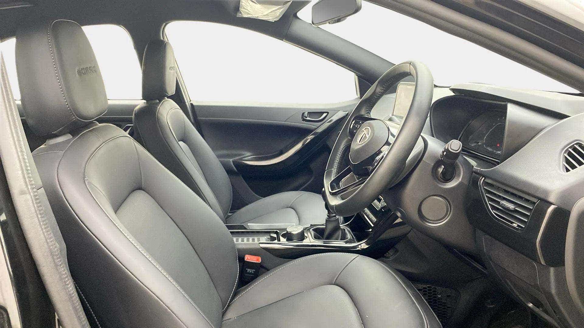 Interior dashboard and front seats of a Tata Nexon 2017-2023