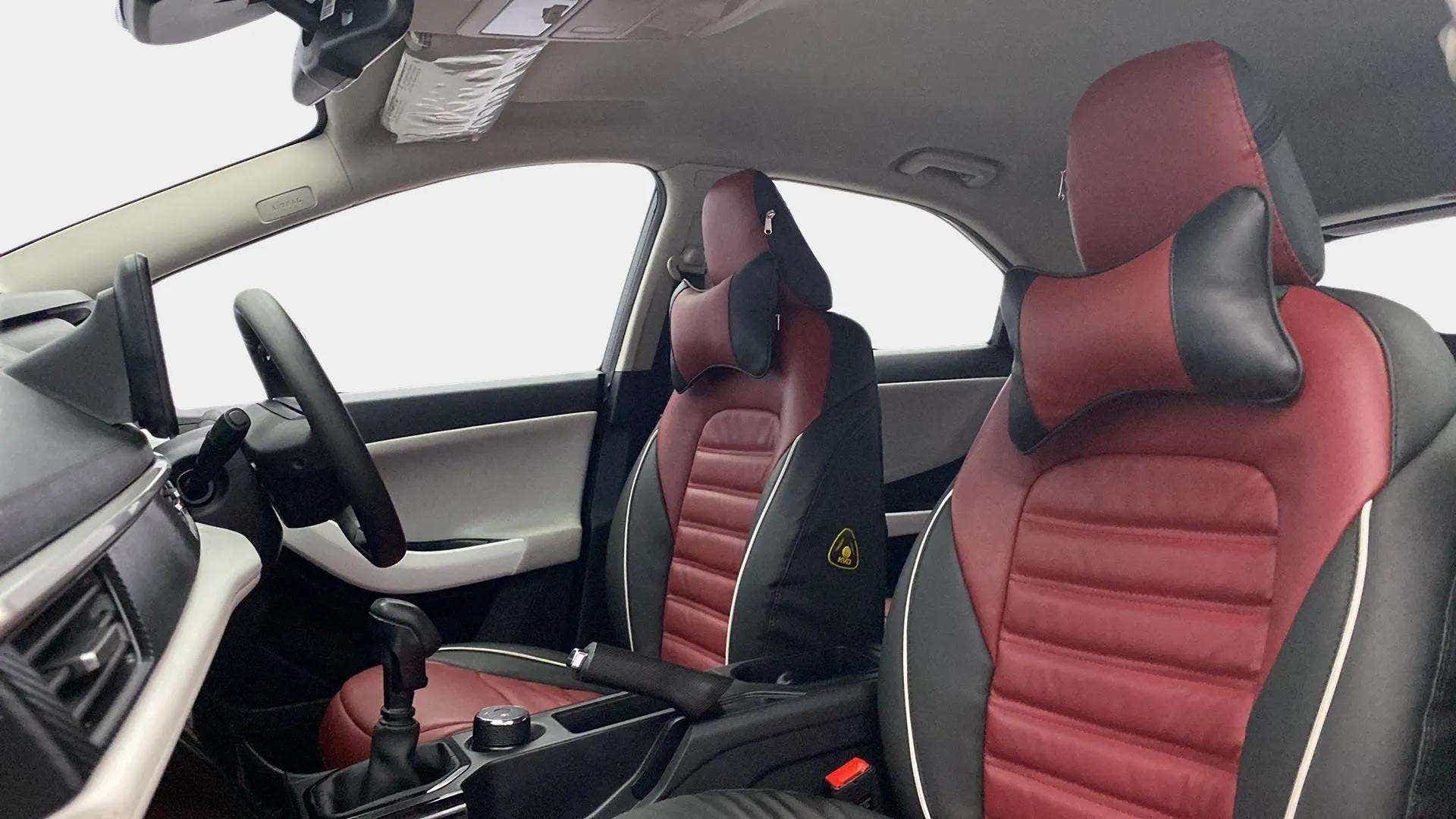 Interior dashboard and front seats of a Tata Nexon