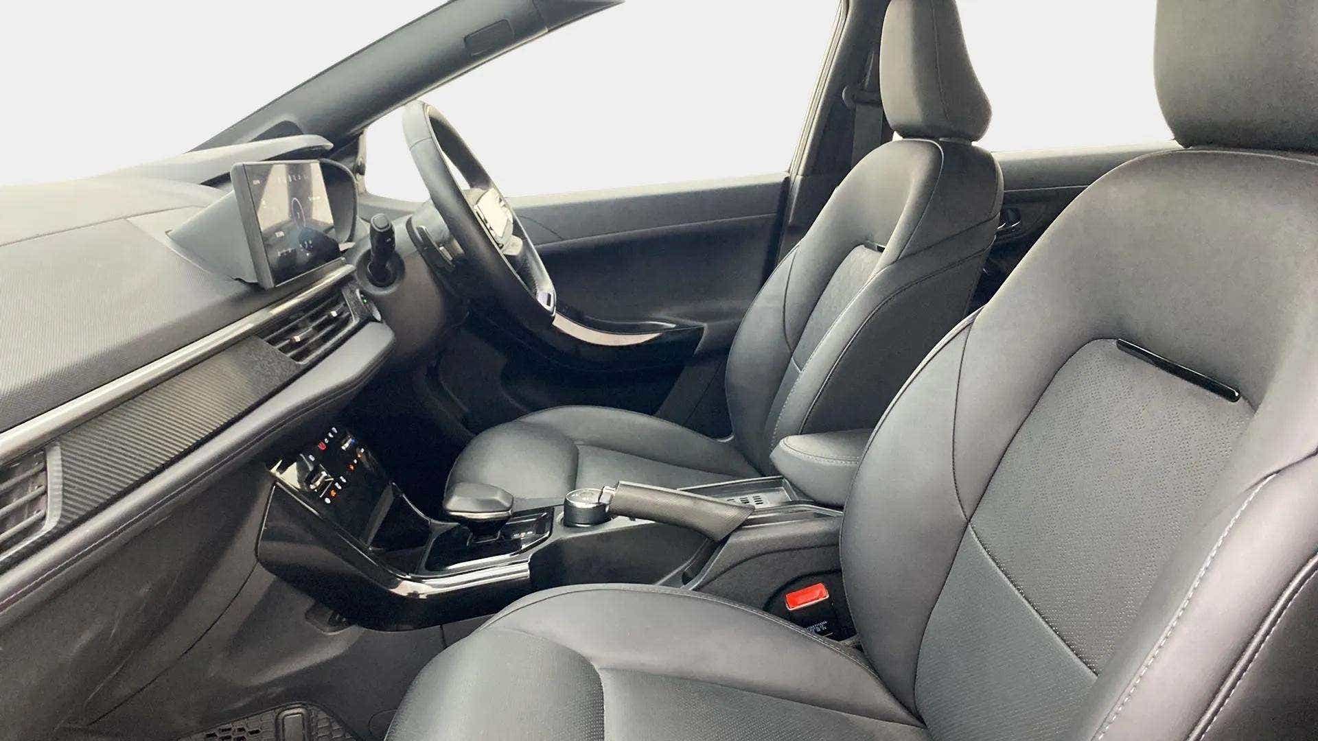 Interior dashboard and front seats of a Tata Nexon 2017-2023