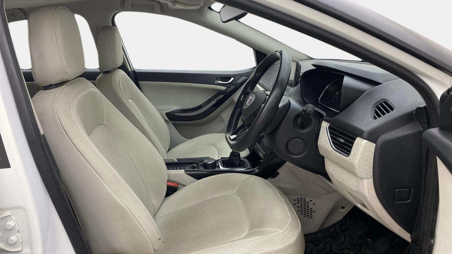 Interior front seats and dashboard of a Tata Nexon 2017-2023