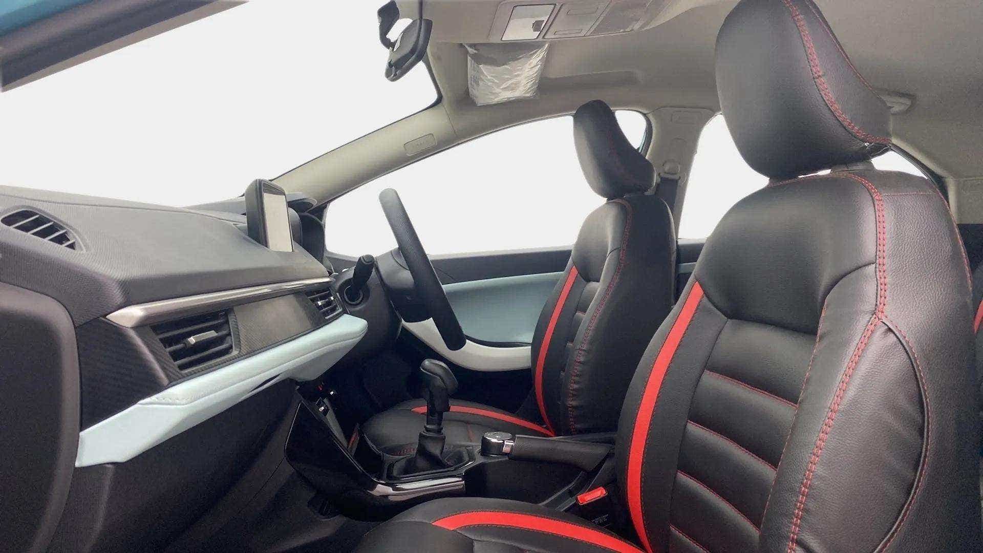 Interior dashboard and front seats of a Tata Nexon