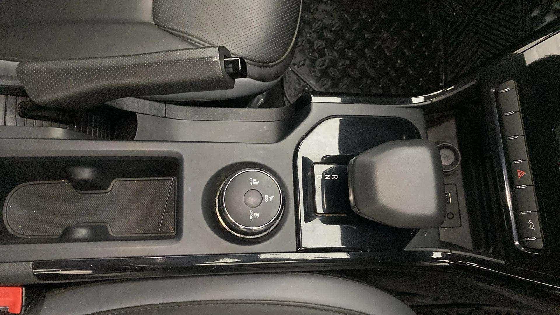 Center console and gear shifter area of a Tata Nexon