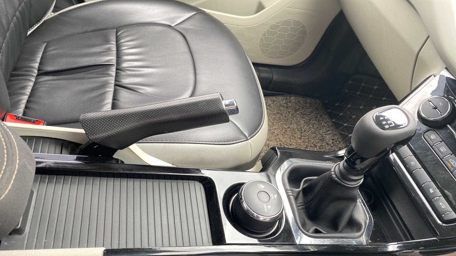 Interior gear lever and parking brake view of a Tata Nexon 2017-2023