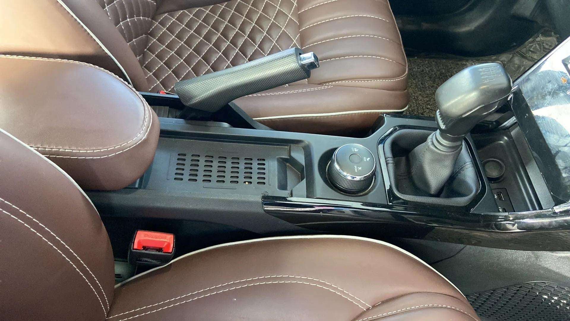 Center console and gear shifter of a Tata Nexon 2017-2023