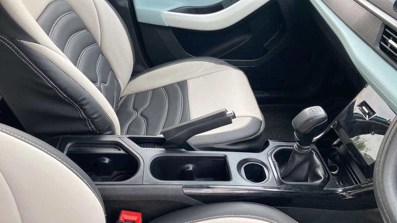 Interior centre console and gear lever of a Tata Nexon