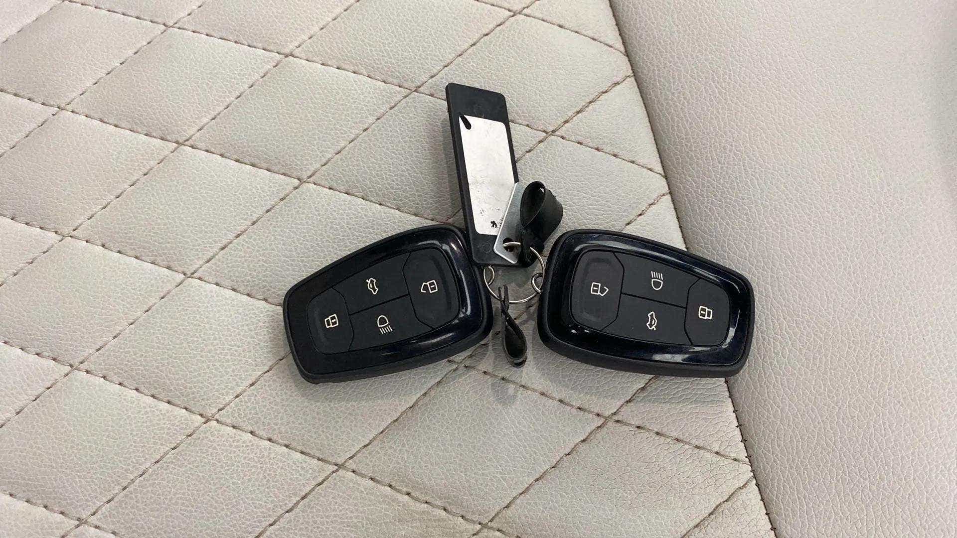 Key fobs on the seat of a Tata Nexon 2017-2023