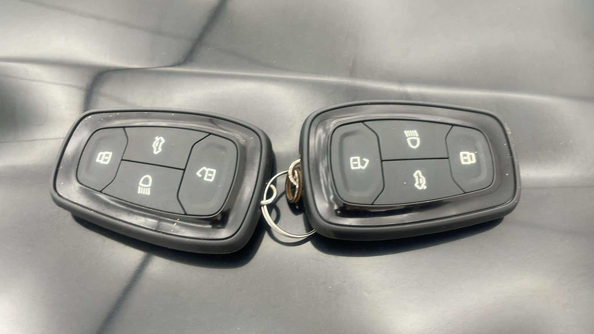 Close-up of key fobs for a Tata Nexon 2017-2023