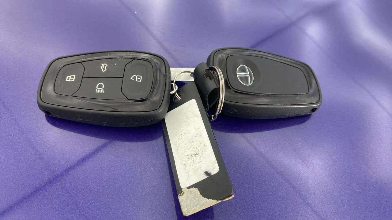 Close-up of a Tata Nexon key fob on a surface