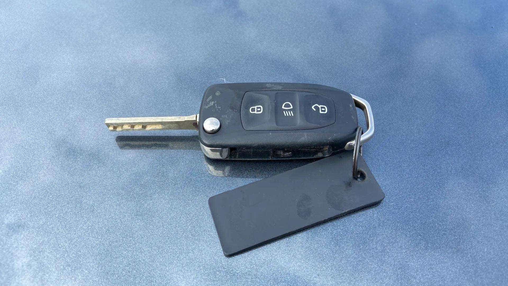 Car key fob placed on a Tata Nexon 2017-2023