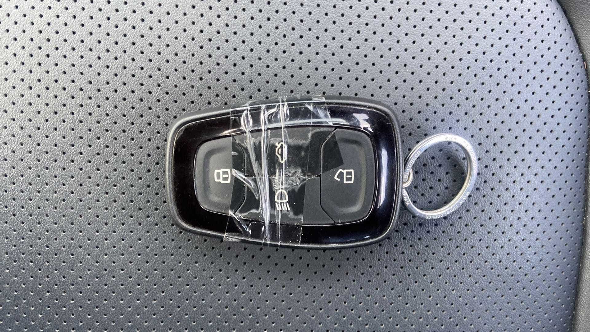 Car key fob on the seat of a Tata Nexon 2017-2023