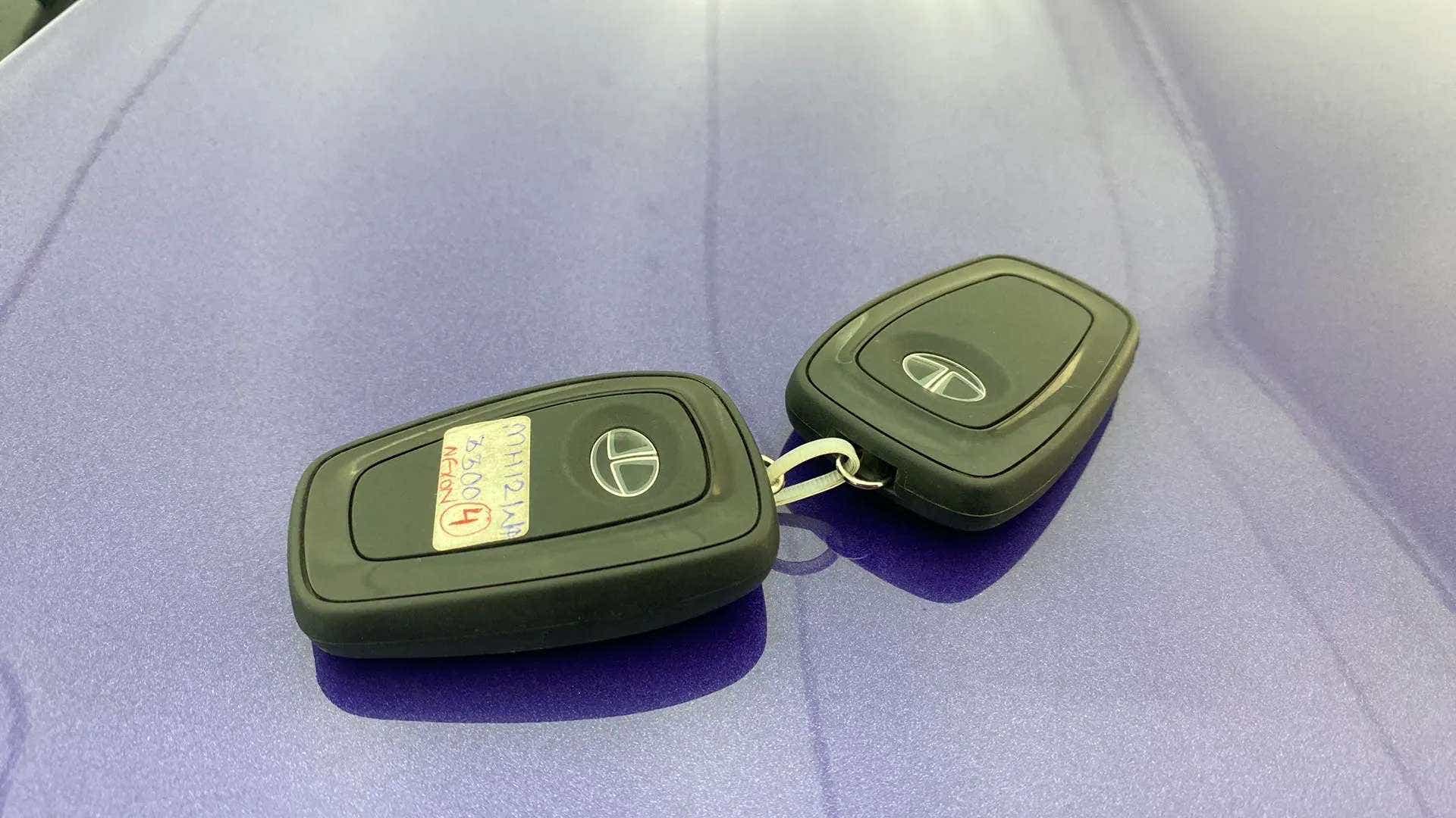 Close-up of car key fobs on a Tata Nexon