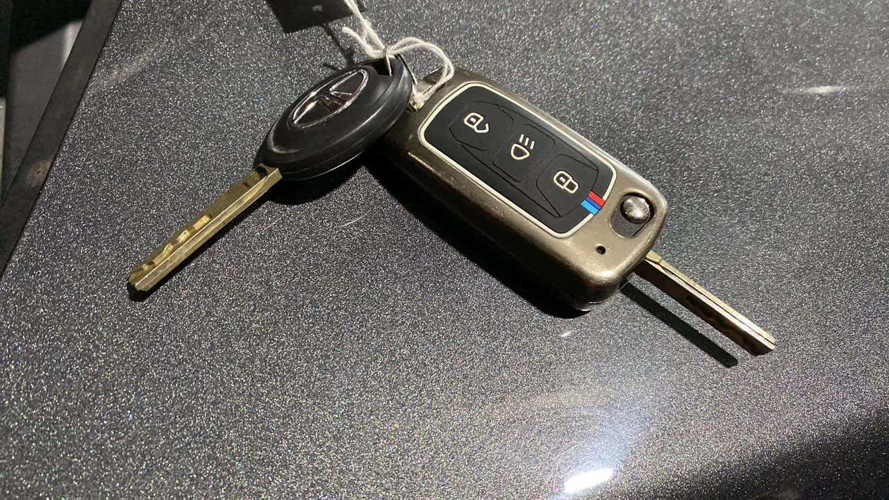 Close-up of a Tata Nexon car key on a surface