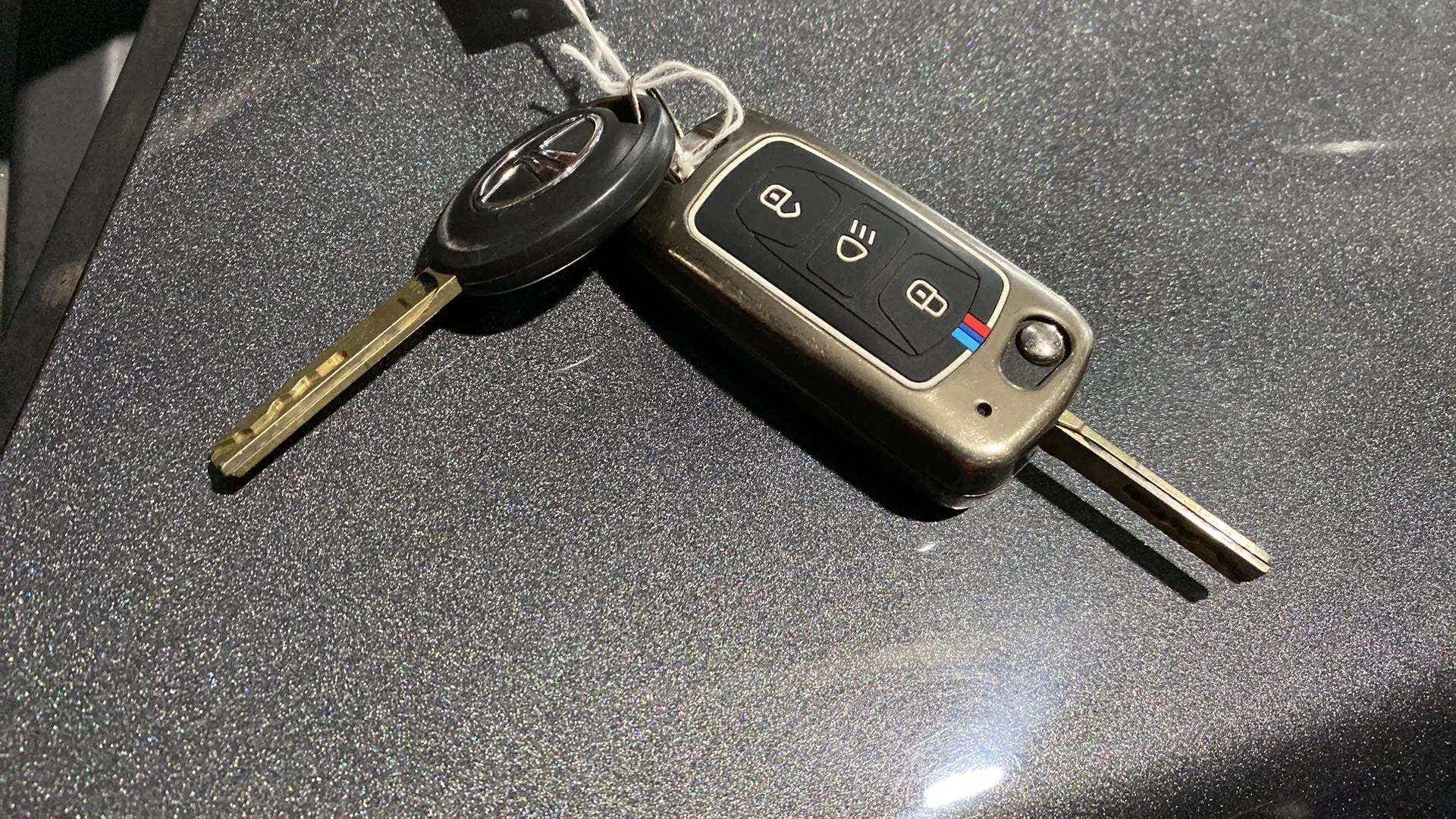 Close-up of a Tata Nexon car key on a surface
