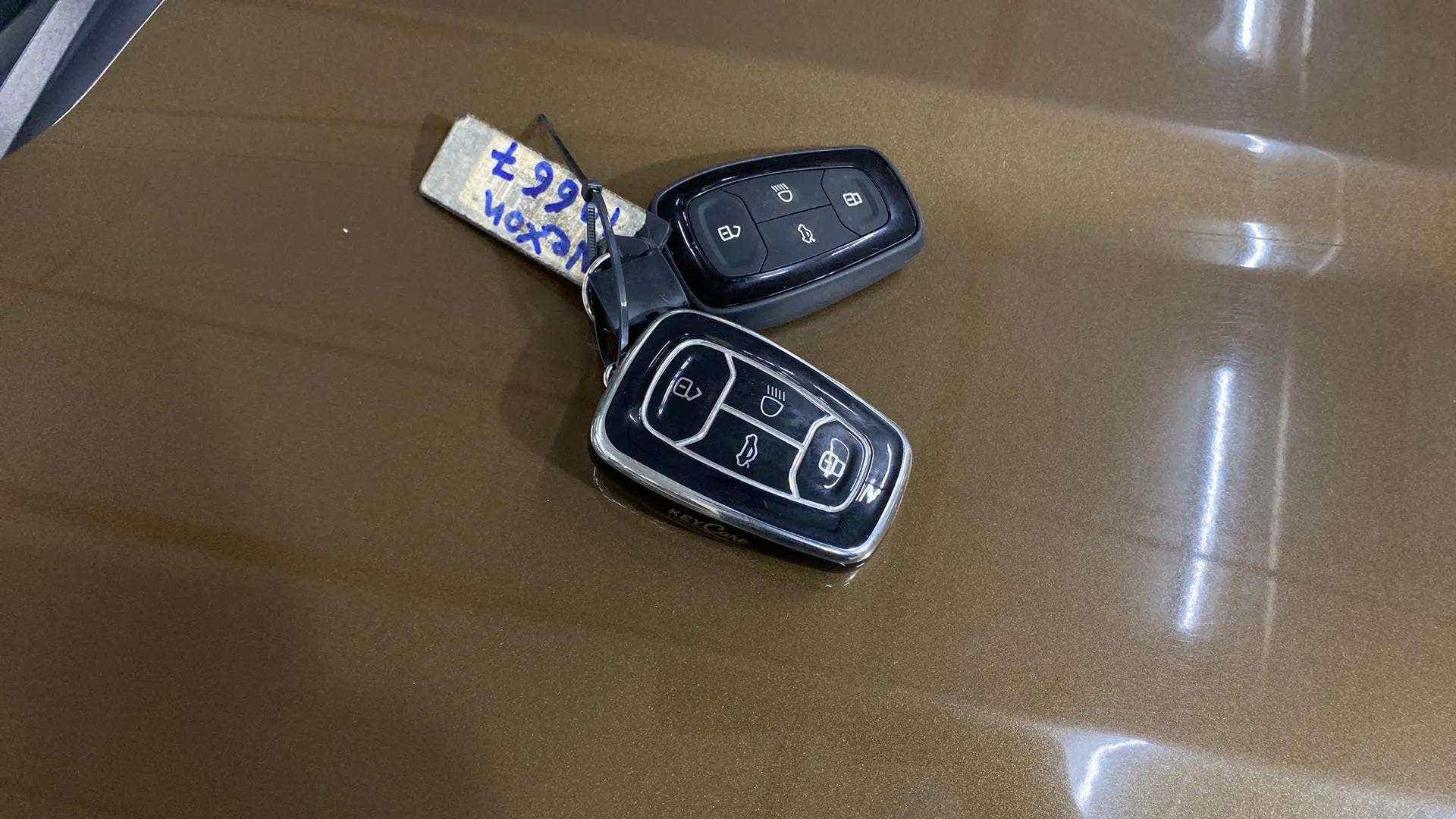 Close-up of car key fobs on a Tata Nexon 2017-2023