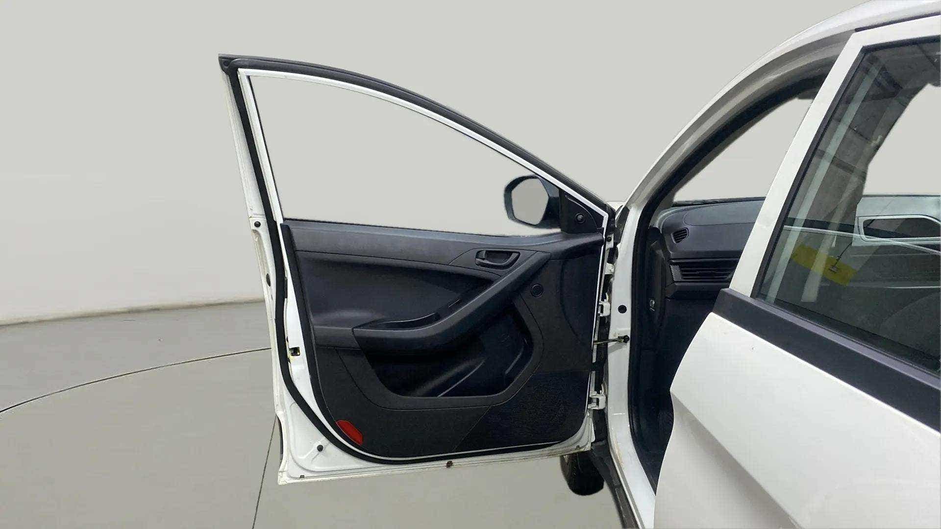 Open front driver-side door of a Tata Nexon