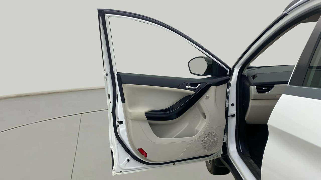 Front left door panel interior of a Tata Nexon 2017-2023