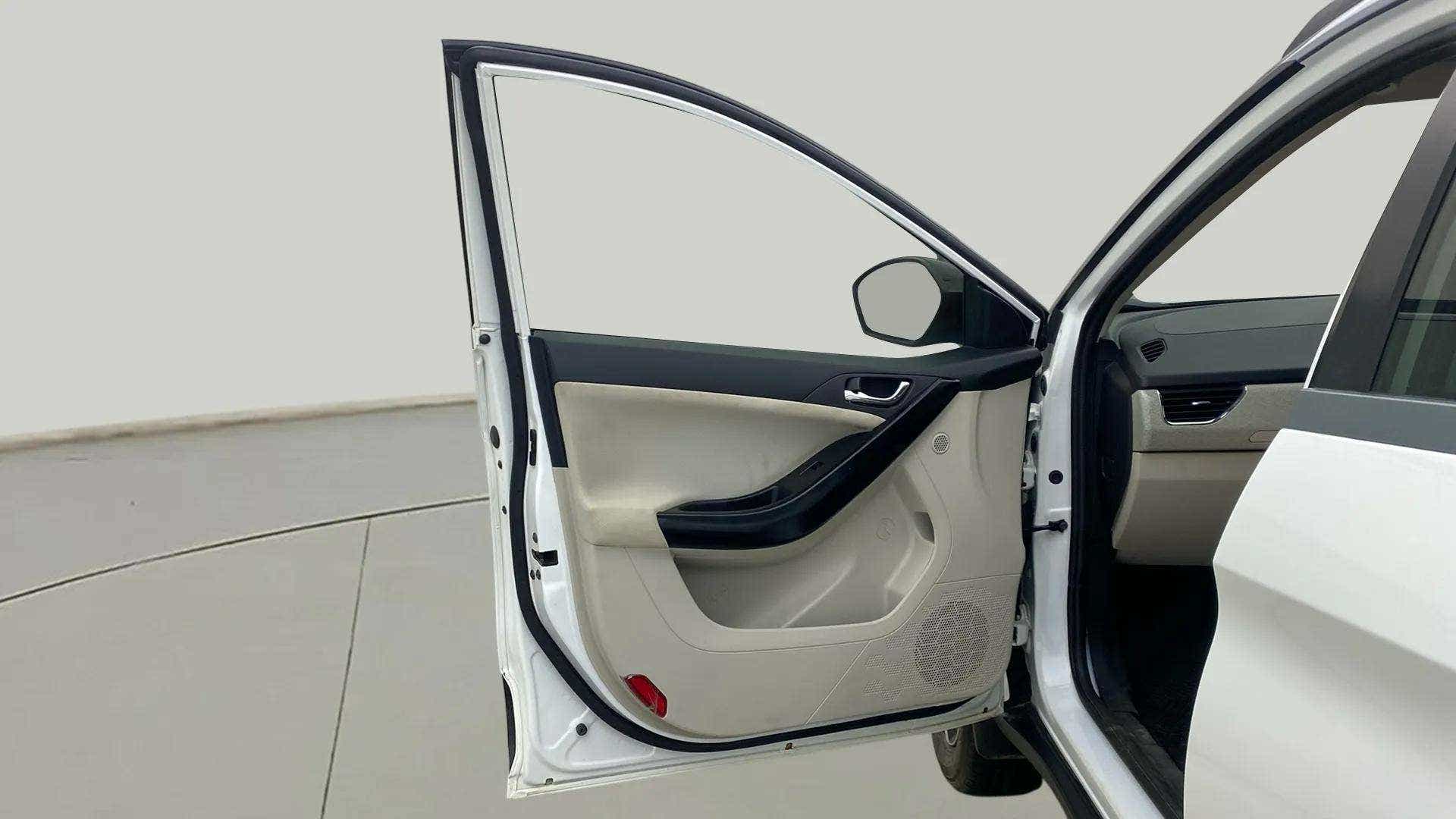 Front left door panel interior of a Tata Nexon 2017-2023