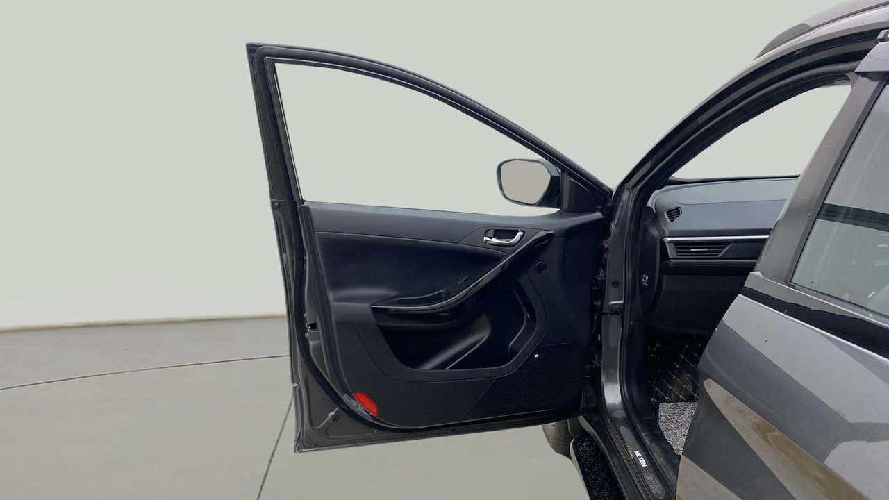 Front door open view of a Tata Nexon