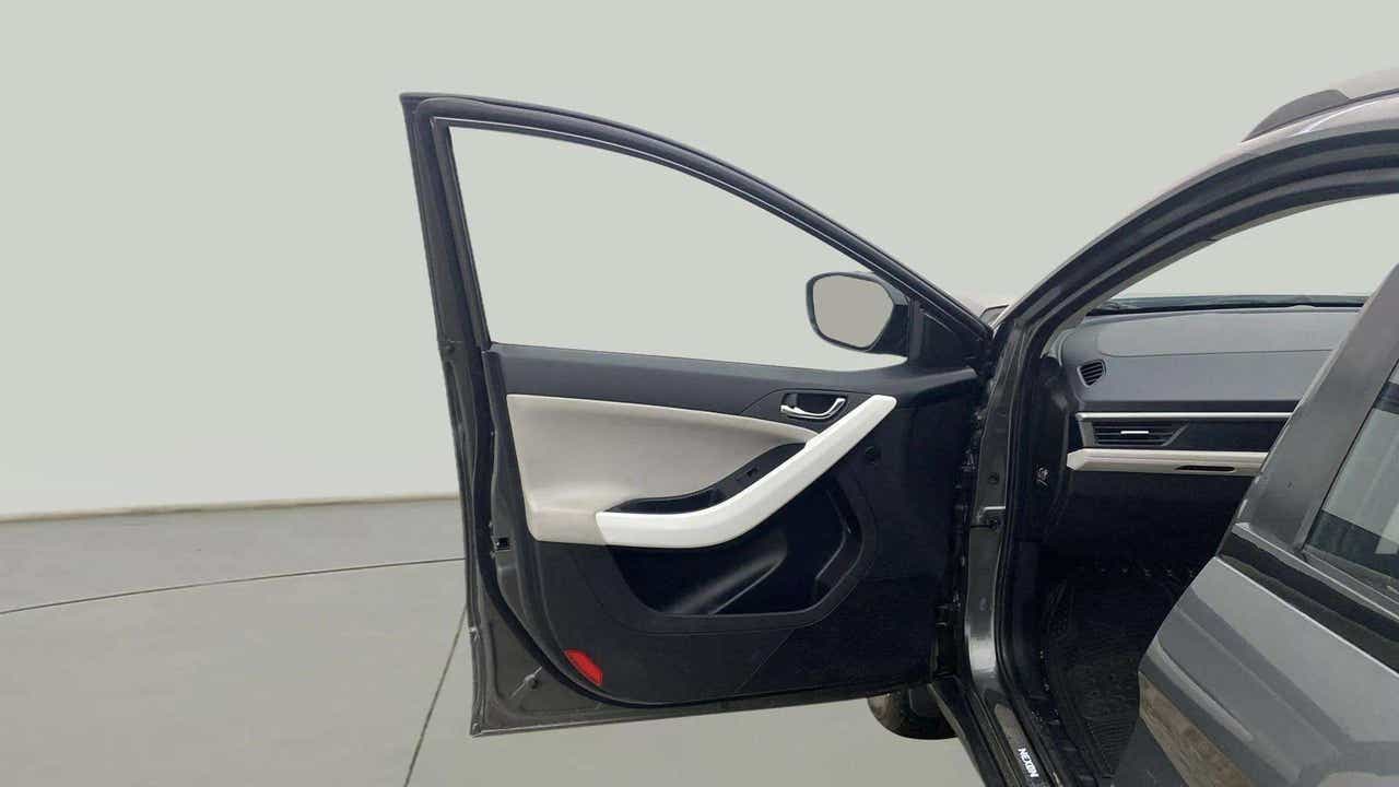 Front driver side door and dashboard of a Tata Nexon