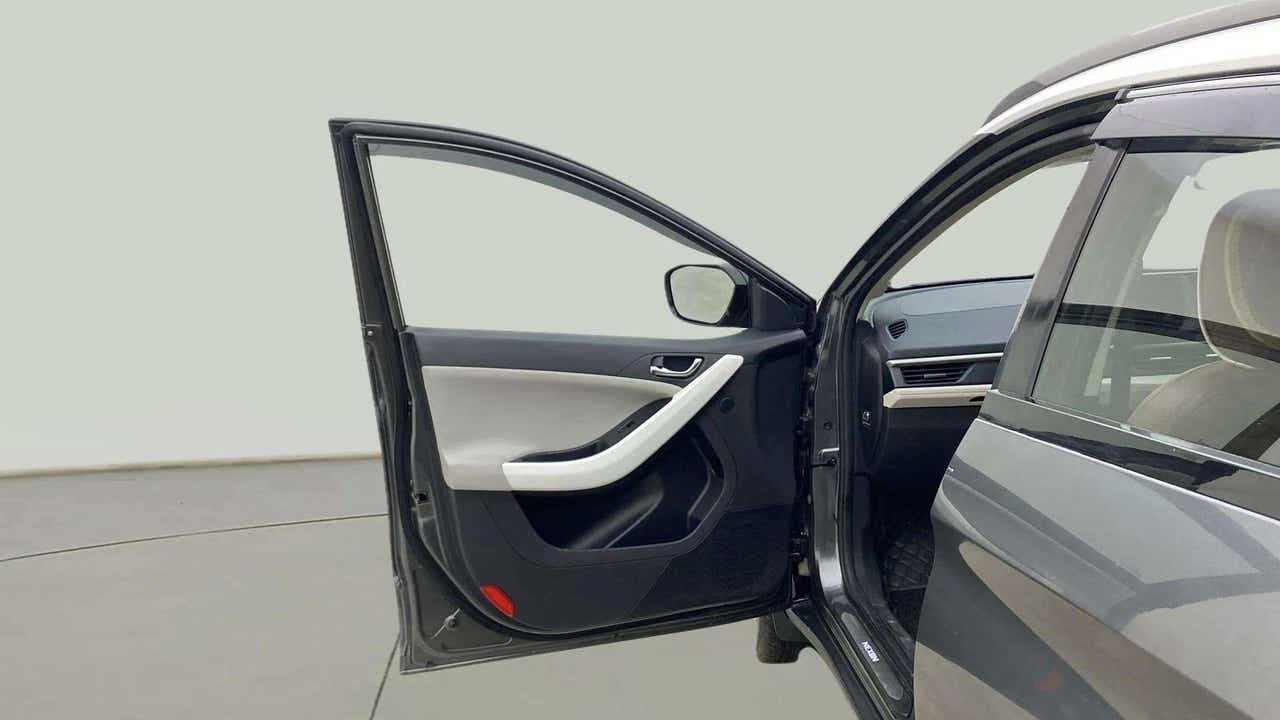 Front driver side door and interior of a Tata Nexon
