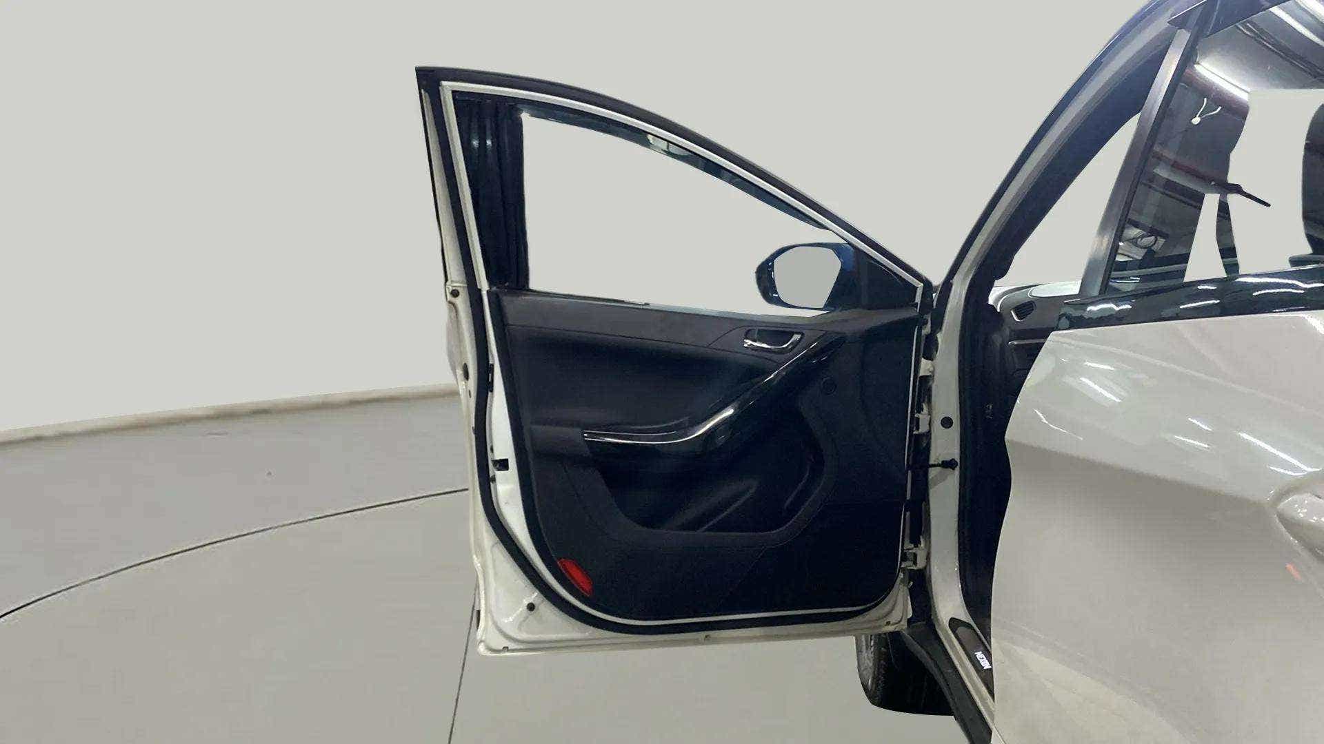 Open front driver-side door of a Tata Nexon 2017-2023