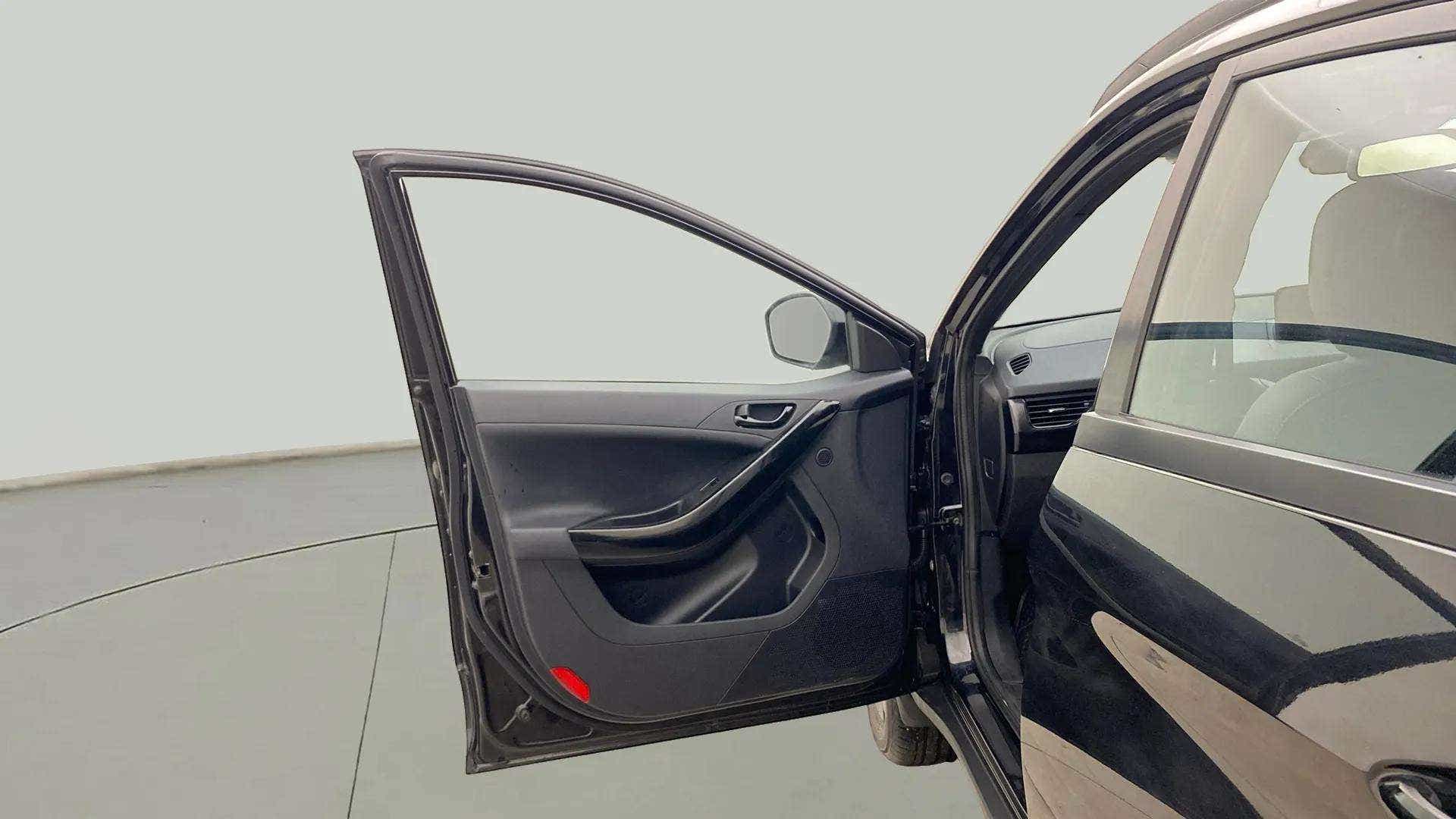 Driver side door interior of a Tata Nexon 2017-2023
