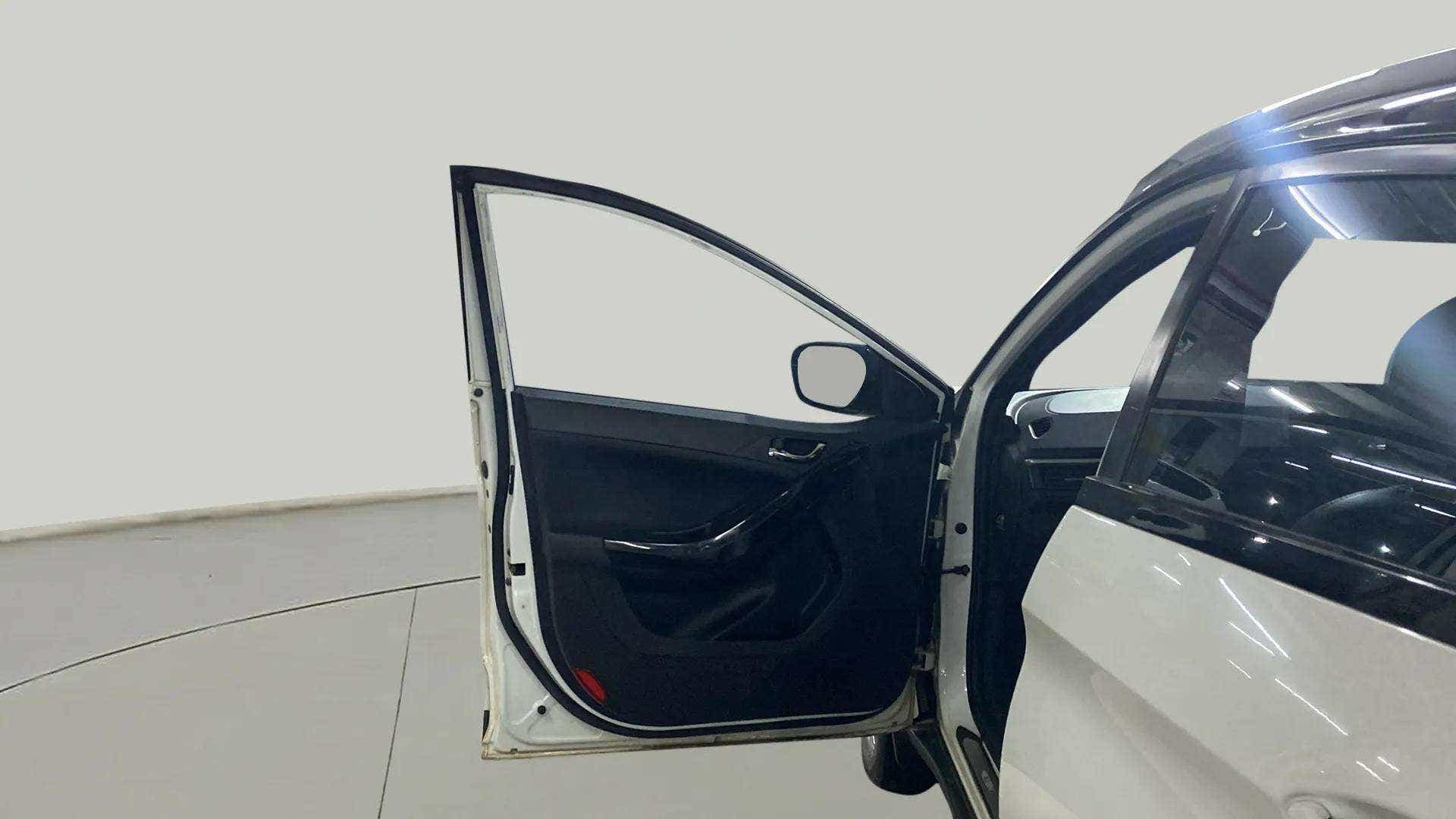 Open front driver-side door of a Tata Nexon 2017-2023