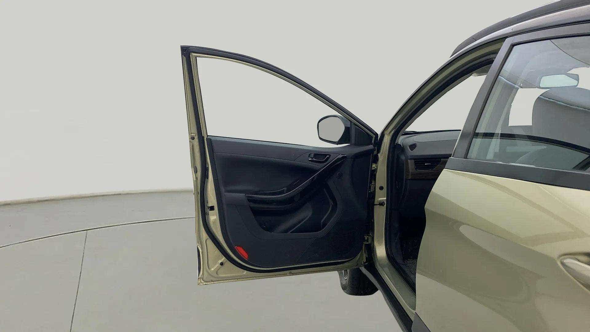Front driver-side door open view of a Tata Nexon 2017-2023