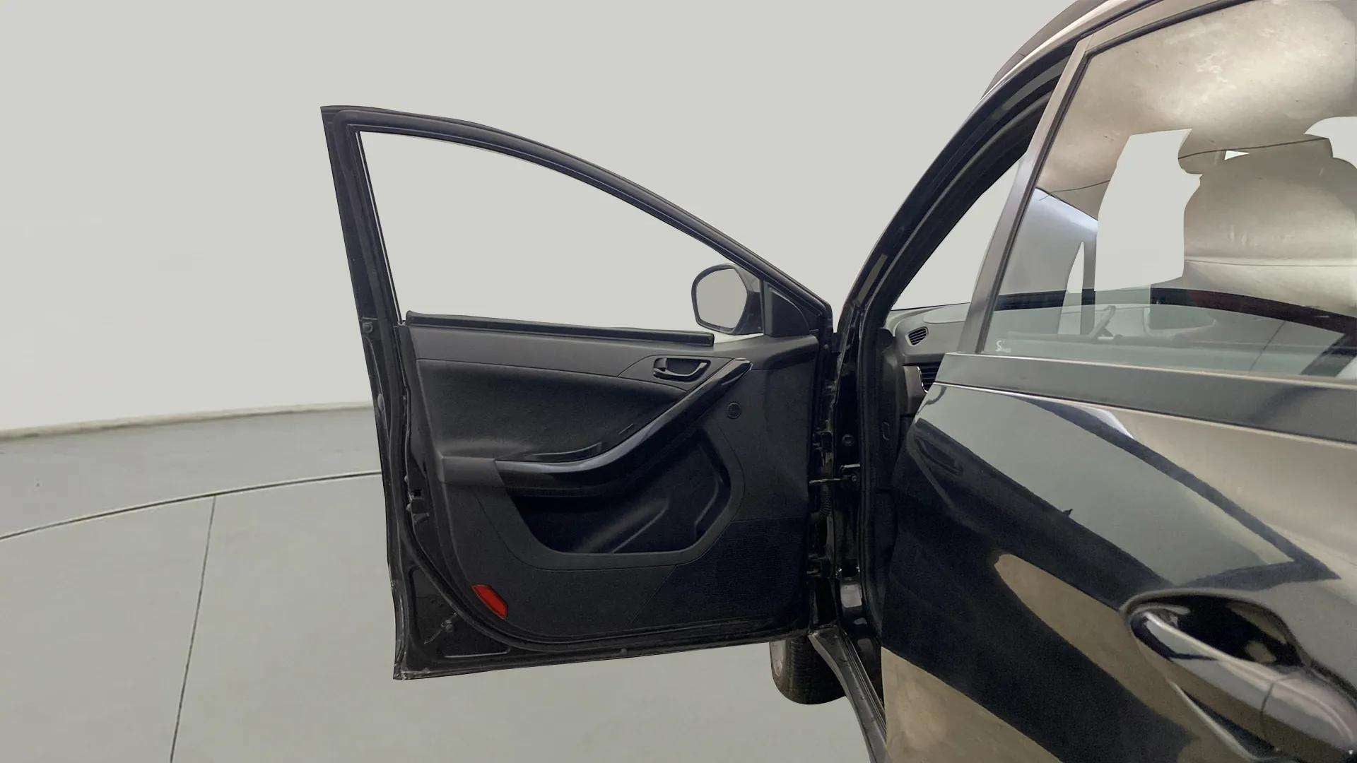 Front driver side door open view of a Tata Nexon 2017-2023