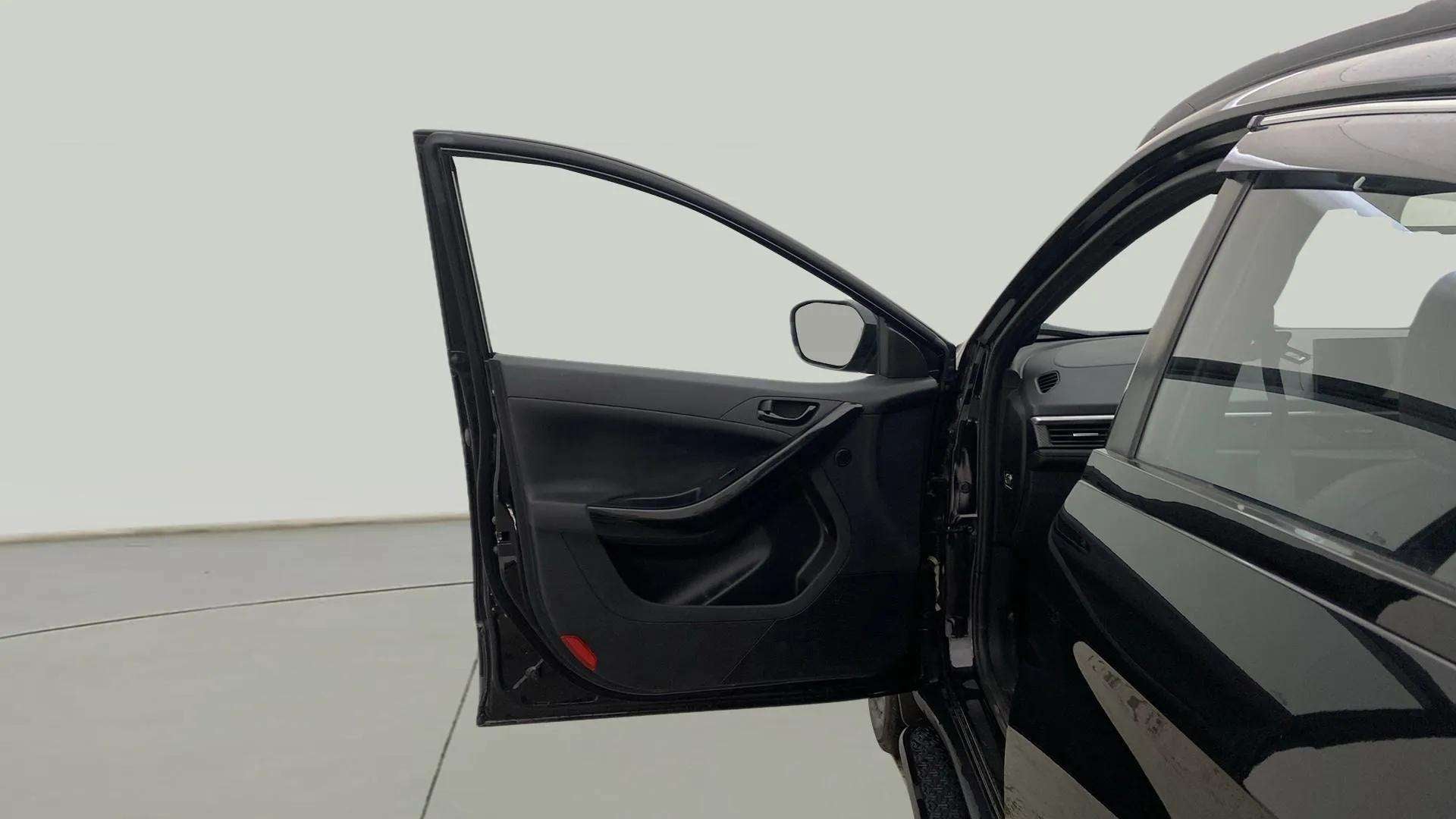 Front driver door view of a Tata Nexon